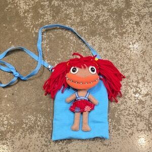 Blue Bag with Red-Haired Doll Design